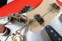 Fender_strat_1961_coral_extra_switches_3