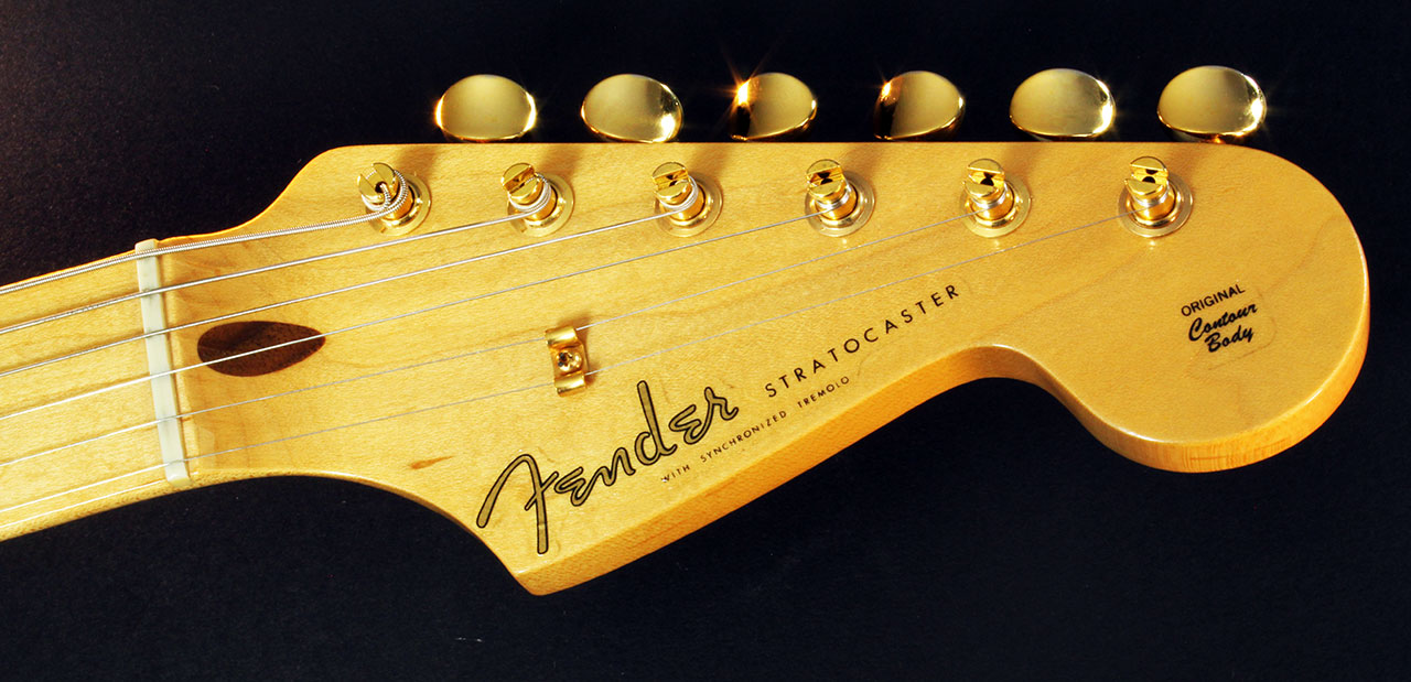 Fender_strat_gold_LTD_1989_cons_head_front_1