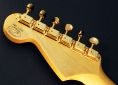 Fender_strat_gold_LTD_1989_cons_head_rear_1