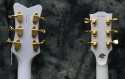 Two_White_Guitars_Heads_back