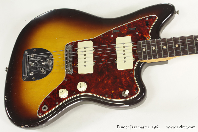 Originally targeted at jazz guitarists, the Jazzmaster features large single-coil pickups, unique electronics, and a somewhat wider fingerboard than the Telecaster and Stratocaster.    The offset body design is intended to make the instrument more comfortable when seated - standing up and moving around was more of a country or rock and roll thin