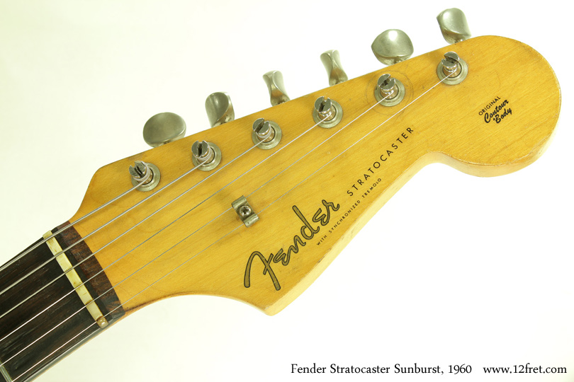 Here's the real deal - a 1960 Sunburst Fender Stratocaster.   The Stratocaster was introduced in 1954, and late in 1959 (for the 1960 model year) the first major revision appeared:  the introduction of the rosewood fingerboard, multi-layer pickguards, and a 3-tone sunburst.