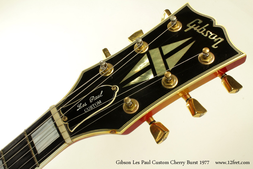 Here's a cool 1977 Gibson Les Paul Custom Cherry Burst.  The Les Paul Custom was introduced in 1954, as a dressed-up version of the 'new' Les Paul model (introduced in 1952).  Originally, it featured a black finish (with a mahogany top rather than maple) and with very low frets.