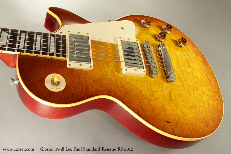 This is a rather nice 2012 example of the Gibson 1958 Les Paul Standard Reissue R8.  The R8 is just a short form for '1958 Reissue', as the R9 model is the 1959 reissue; the main difference now is the neck profile.   The R8 has a somewhat chunkier neck compared to the R9.