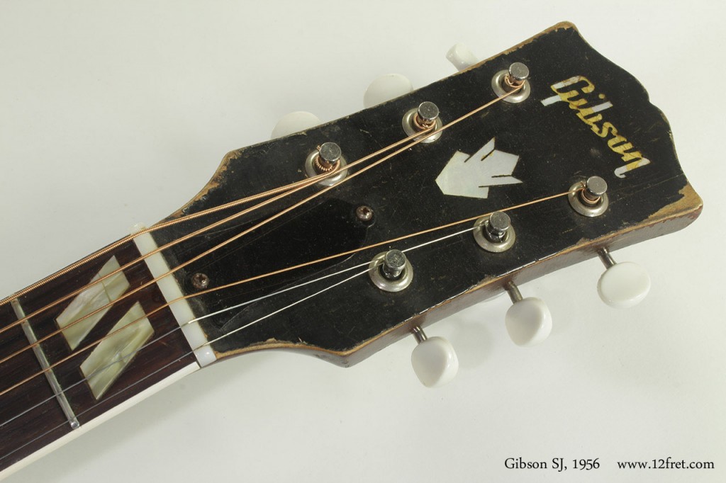 The Gibson SJ, or Southern Jumbo, was Gibson's slope-shoulder answer to the Martin square-shoulder dreadnought.   It was introduced in 1942 with Sunburst as the available finish until 1954.    This example of the 1956 Gibson SJ is in good playing condition, with lots of wear.  This guitar has been used as intended!