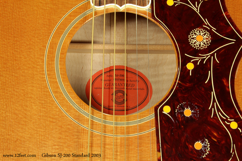 The Gibson SJ 200 is one of the iconic steel string flat top guitars.   Introduced in 1937, it was an immediate hit.   While it's a fairly large guitar - according to the 1938 Gibson catalog, the SJ stands for Super Jumbo, after all - it's actually quite comfortable to play.   Tonally, it's very even, and can be rather loud with great projection.