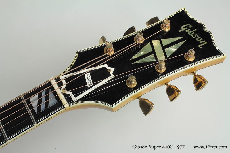 Once, giants roamed the earth's stages and the Gibson Super 400 was at the top.  Introduced in 1934, the Super 400 was priced at $400 -- hence the name.  Still in production, the price has increased somewhat. 

The cutaway became an available option in 1939, with the model name of 'Super 400 Premiere', but eventually became the C model for 'Cutaway'.   In the 1950's, the Super 400 started getting pickups, with a thicker top to reduce feedback.

This rare acoustic model is in great shape and looks back to the way the top-range guitars were just before WW2.
