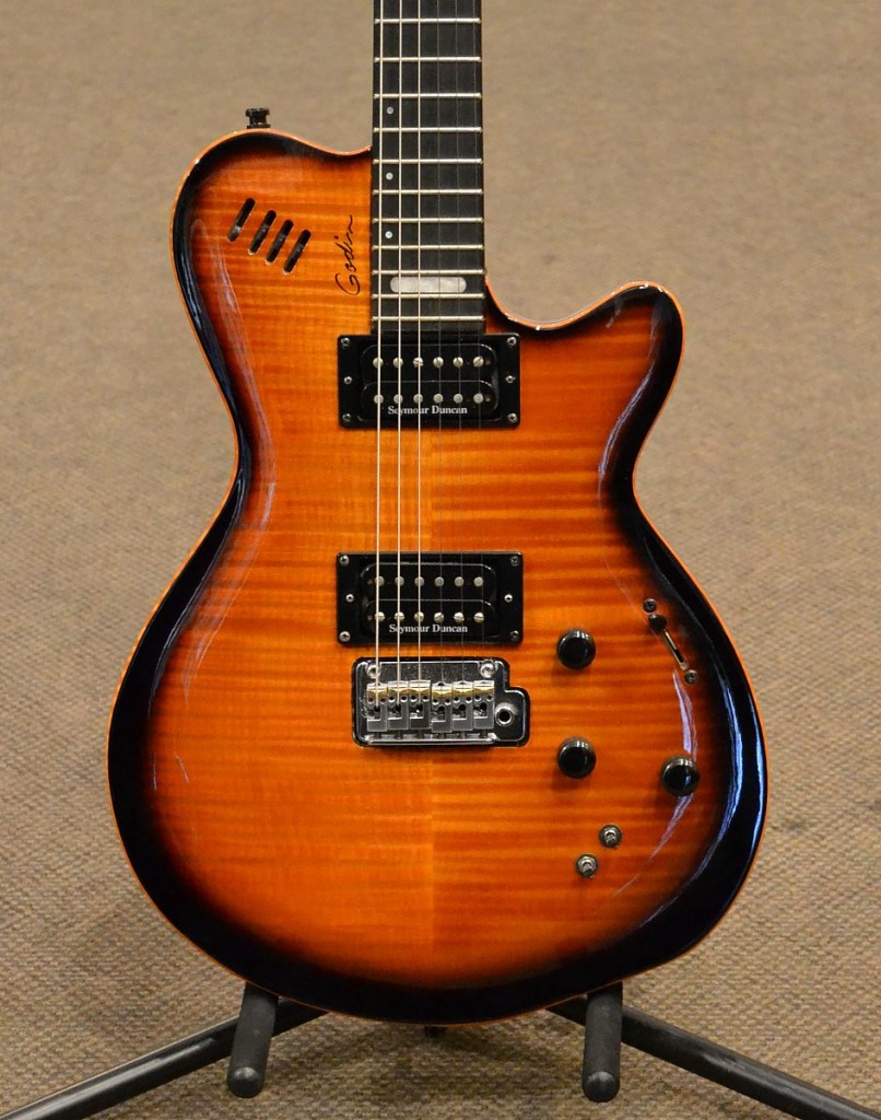 This Godin LGXT AAA is in great shape and features loads of tonal versatility for $1399.99