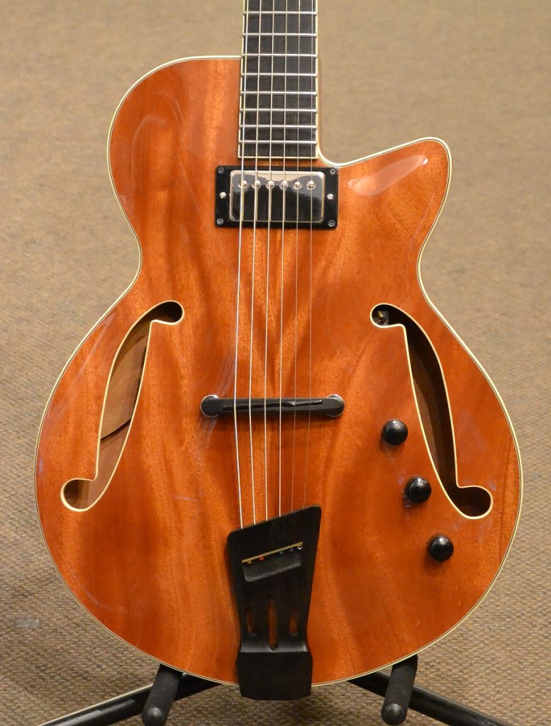 This Harrison GB Custom Mahogany model by Doug Harrison has it all, top notch crafstmanship, excellent playability, great looks and killer tone! Sells for $3900.