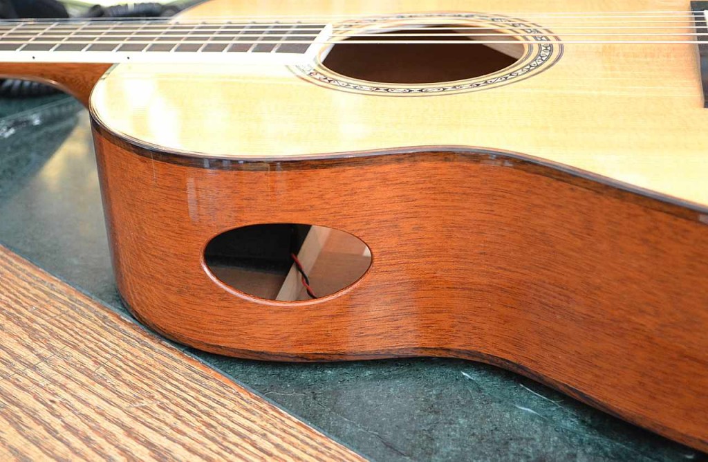 Here is a beautiful Larrivee L-05 with an aftermarket side port modification!