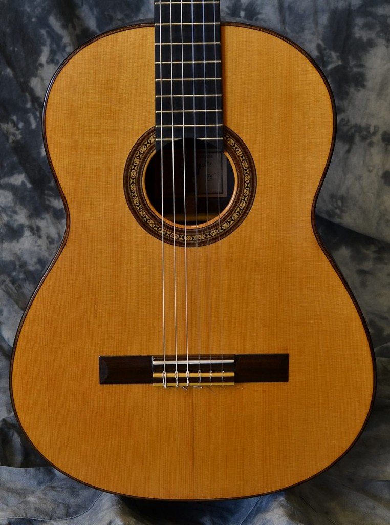 Here is a Larrivee Classical from 1975, built while Jean Larrivee was here in Toronto. Aside from some cosmetic wear and tear this guitar is in great shape, has a great well balanced tone and comes with the original archtop hardshell case.