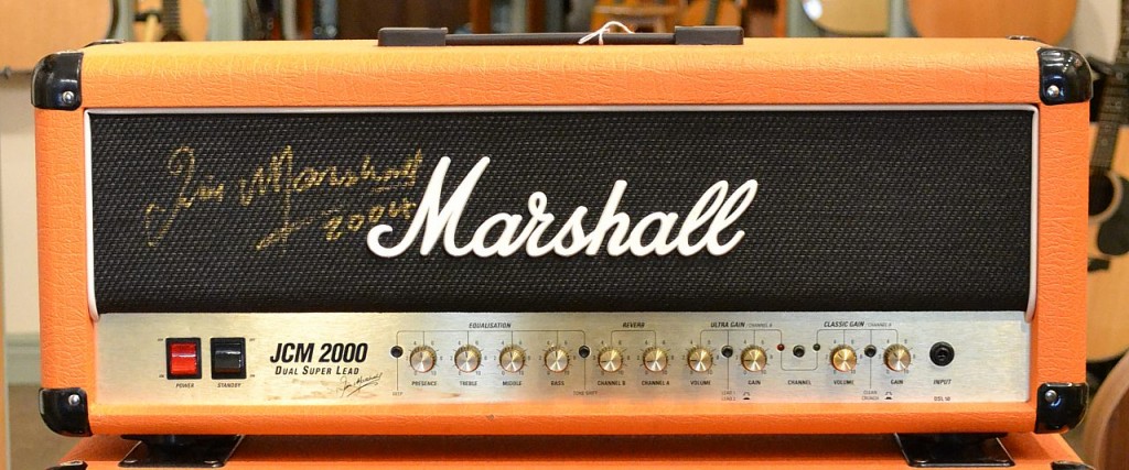 A signed orange half stack from Marshall selling for $1599.