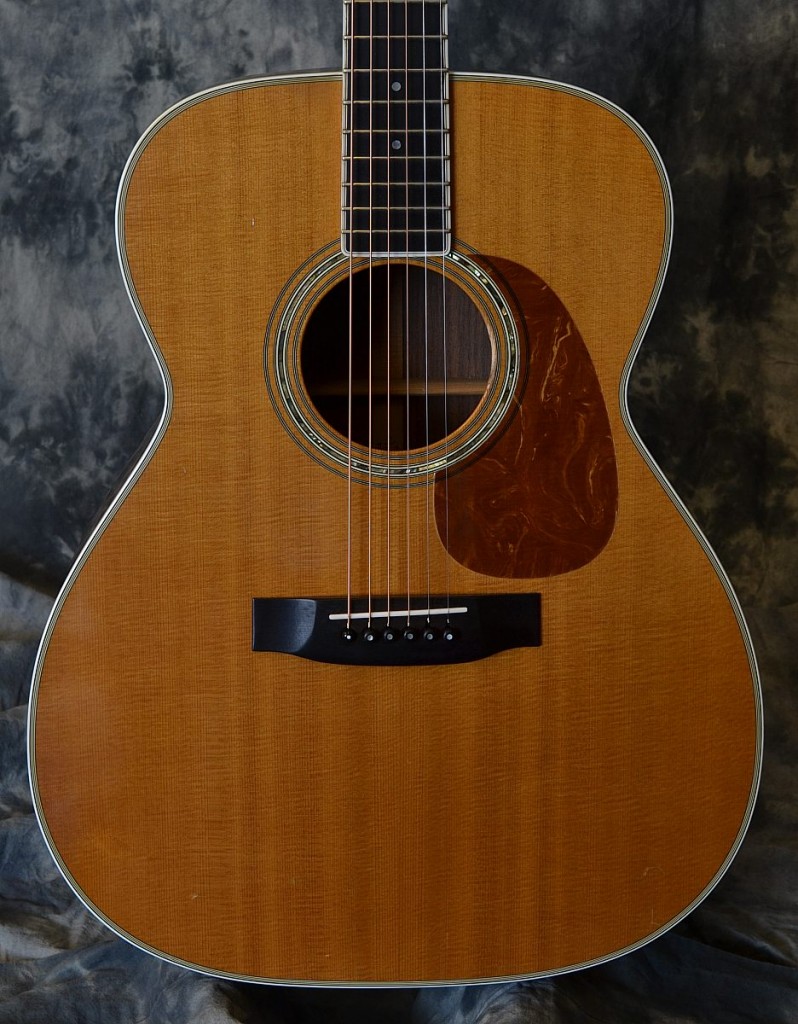 The M body shape from Martin provides a bit more volume and bass response than a typical OM or 000. This example is in decent shape and comes with an older arched top hardshell case.
Note: Borderline neck set: plays fine in lower positions but action measures 6/64 treble to 8/64 bass side…on the high side with little remaining saddle for adjustment.