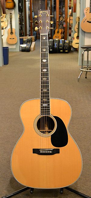 Here is a very cool Martin J-40 M that sounds and plays great for $1250.