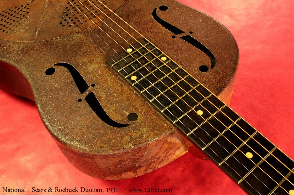 National built instruments for Sears and Roebuck only during 1931. These models are distinctive as made for Sears and Roebuck because the coverplate has five vented section instead of nine, and the serial number contains an 'R' - stamped on the top of the head.