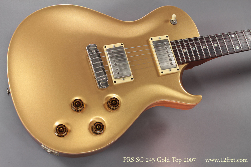 Here's a very nice 2007 PRS SC 245 Gold Top Singlecut Solidbody. The single-cutaway solidbody design has certainly proven itself over the last sixty years. Paul Reed Smith's take on the idea features mahogany back and maple cap, set neck construction, but has a slightly elongated body that's really quite attractive.