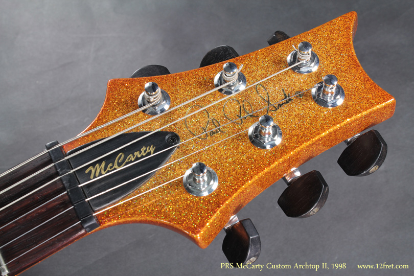 This is a wild 2008 Gold Sparkle PRS McCarty Archtop II!  Custom built for a prominent Canadian touring band, this unusual instrument has been well maintained and is ready for the stage or set. Paul Reed Smith introduced the McCarty Archtop and Archtop II in 1998, but discontinued it in 2000.     Most of the McCarty archtops have  carved mahogany back and mahogany sides, and spruce top.   This Archtop II,(and its silver-sparkle sister) has carved maple top and back, and maple sides.