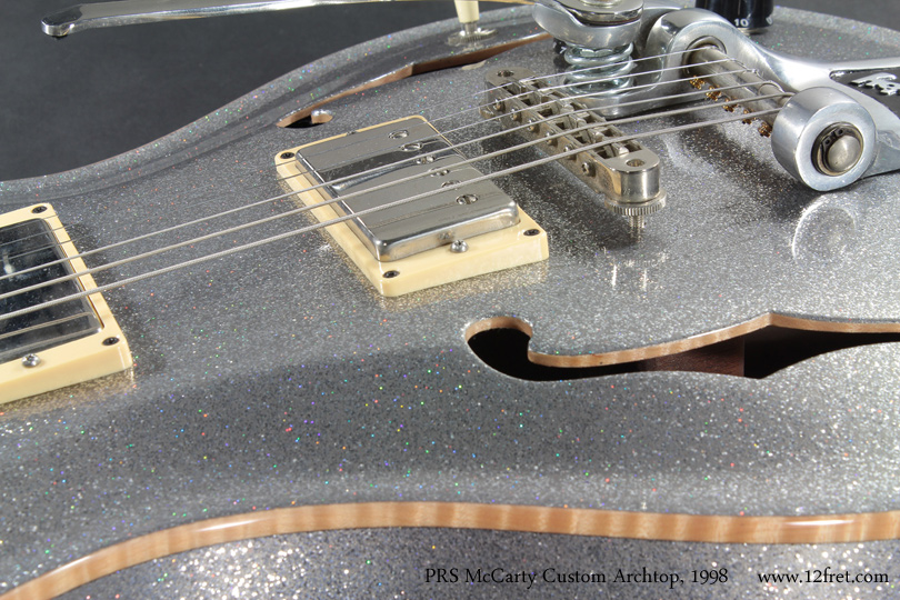 This is a spectactular 2008 Silver Sparkle PRS McCarty Archtop II!  Custom built for a touring band, this unusual instrument has been well maintained and is ready for the stage or set. Paul Reed Smith introduced the McCarty archtop in 1998, and this version was produced until 2000.