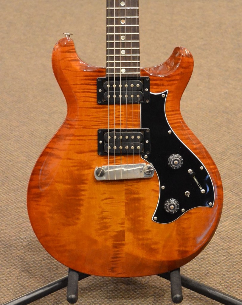 Here is a great smaller and lighter PRS solid body with a nice variety of tones available through the humbuckers which can be coil tapped. This guitar is in good overall condition with very little fret wear and only some minor cosmetic wear and tear. Comes with original hardshell case.