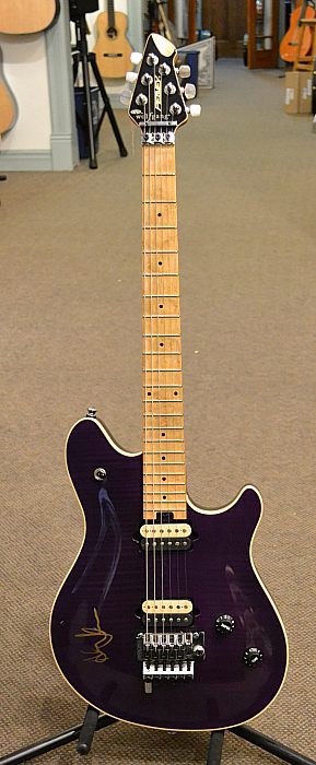 Here is a really cool purple finish Peavey EVH Wolfgang in great overall shape. This particular example has been signed by Alex Lifeson but more importantly is has all the features to have you Running with the Devil in no time!