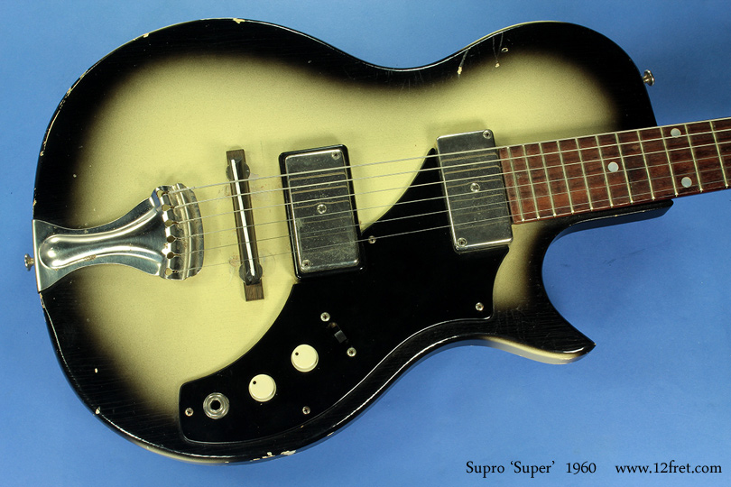 Here's a really cool Supro Super model, built in 1960.  Even less usually, this is a two-pickup model.    The Super is a short-scale - 22 inch! - guitar likely intended for students.  

This instrument features a 'silverburst' finish, basically a white to black sunburst; this has also been used by Gibson on some Les Paul Custom models and by Fender, who named it 'Antigua'.