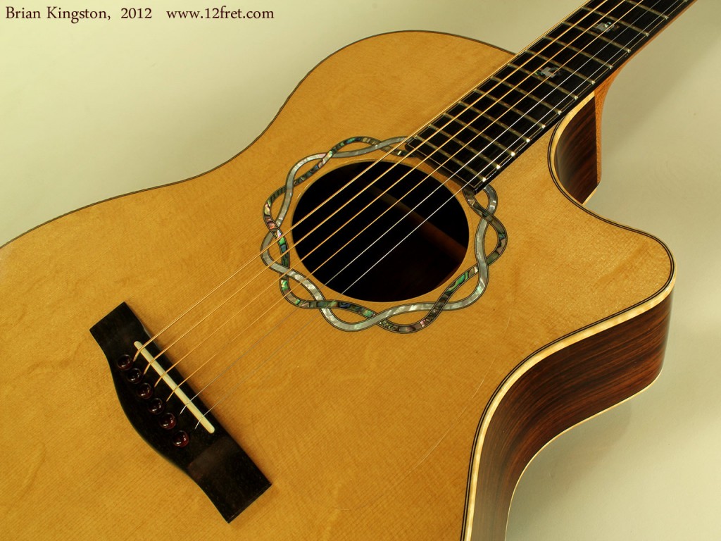 Here's a beautiful BC Kingston acoustic cutaway from the shop of Brian Kingston in PEI.   Featuring a bearclaw sitka spruce top, Indian rosewood back and sides, sapele mahogany neck and Gabon ebony fingerboard, headcap and bridge, this guitar is stunning.