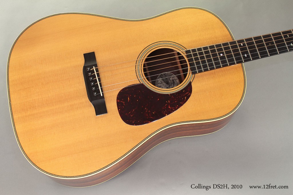 This Collings DS2H features a Stika Spruce top, Indian Rosewood back, sides and headplate, and ebony for the fingerboard and bridge. The top is bound with herringbone purfling and the back features a herringbone center strip.