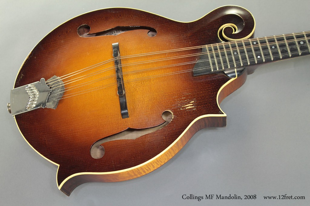 This sunburst example of the Collings MF Mandolin from 2008 has been used as intended by a prominent bluegrass player. It is thoroughly played in, so along with the honest, well-earned wear and tear, its tone has fully developed.