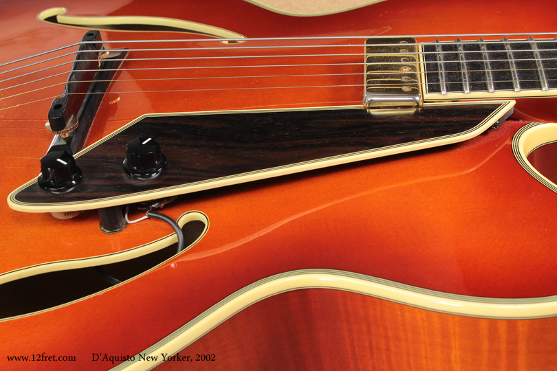 Here's an unusual find:  a 2002 DAquisto New Yorker archtop.   This is model DQ-NYE. 

James D'Aquisto apprenticed to John D'Angelico in New York, and following D'Angelico's death began building guitars with his own name, until his death in 1995.    Original D'Aquisto guitars are rare and extremely valuable, into the hundreds of thousands of dollars.