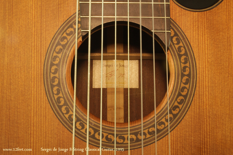This 1995 Serge de Jonge 8-String Classical guitar from his Toronto shop is in good playing condition and shows off Sergei's skills.   The woodworking is very well done - the ebony arm and back contours are not simple to make