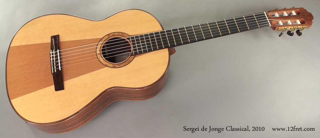 From his shop in Chelsea, Quebec, Sergei de Jonge comes up with some innovative designs, and excecutes them flawlessly.   This 2010 Sergei de Jonge Classical Guitar features a lattice braced, combination spruce and cedar top with Indian Rosewood for the back, sides and headplate, mahogany for the neck, and ebony for the fingerboard and bridge.