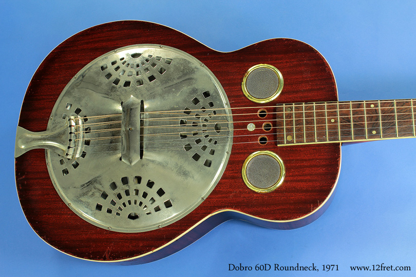 Here is a cool Dobro 60D Roundneck from 1971.   This instrument is not in pristine condition, but could be restored; we've decided to leave that for the next owner.   

It's currently set up to work lap-style - with a steel rather than a slide - and in that configuration, it's quite playable and sounds good!