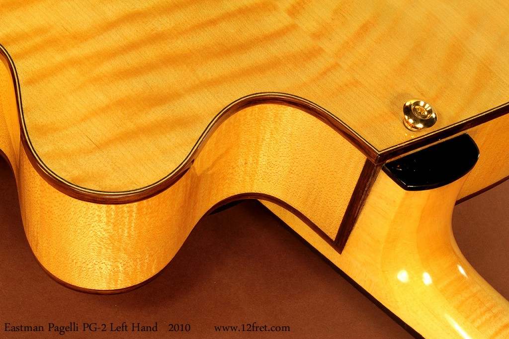 Left-handed instruments are hard enough to find - just try to find a left-hand archtop cutaway jazz guitar - wait, here's an excellent one!  Featuring the distinctive, offset Pagelli body plus carved solid (not laminate) spruce top and heavily-flamed back.