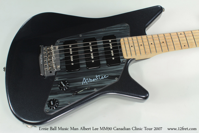 Here's an Ernie Ball Music Man Albert Lee MM90 Canadian Clinic Tour 2007 guitar!  It's in perfect condition.  

The pickguard of this instrument is signed by Albert Lee and a signed photograph is also included.   All the original case extras are included.