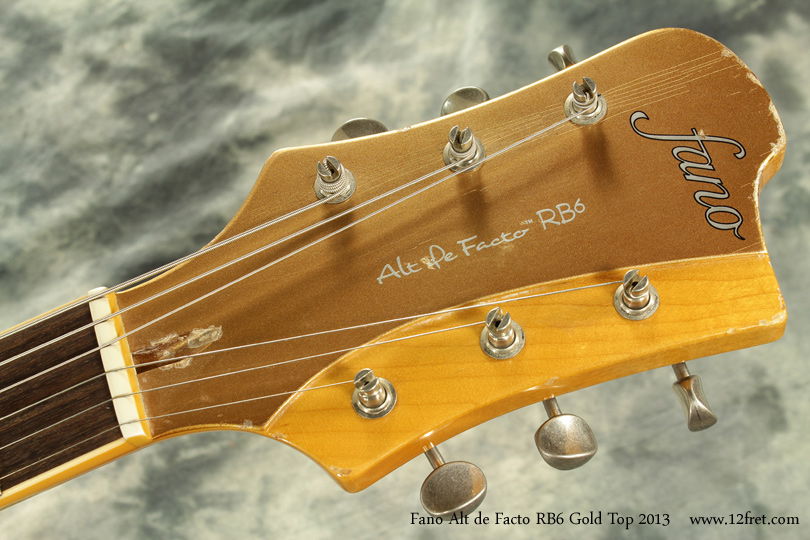Here's a medium-level relic 2013 Fano Alt de Facto EB6 Gold Top.   It's in close to new condition, though with a relic that means something entirely different than shiny! This instrument has unique lines, is extremely well built.  It's got a great clear, crisp tone with lots of definition.   It's very resonant and just rings right out.    And it looks like it's 50 years old!