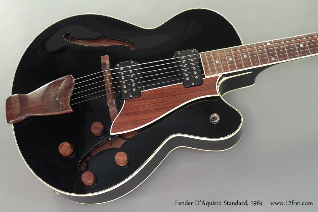 Here is a lovely 1984 Fender DAquisto Standard Archtop Black.    In late 1983, in a co-operative effort with James D'Aquisto, Fender introduced the single-cutaway, fully hollow D'Aquisto Archtop as part of the Master Series.  The Fender D'Aquisto models include the Elite (with one pickup and gold hardware) and the Standard (two pickups and chrome hardware).