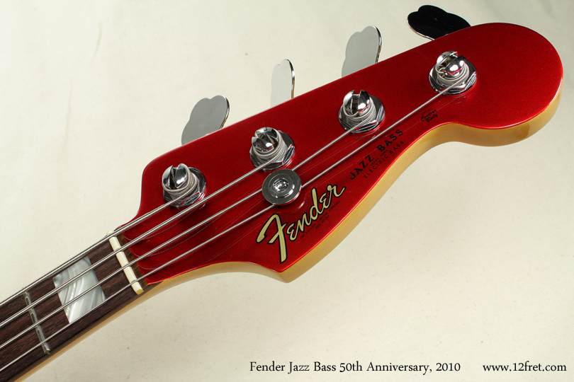 This afternoon we have a 2010 metallic red Fender 50th Anniversary Jazz Bass in pristine condition.   The Jazz Bass was introduced in 1960 and was an instant hit, with its wider range of tones (compared to the Precision Bass) and its slim neck.