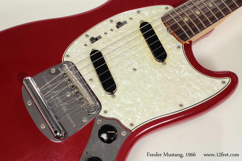 Here's a lovely 1966 Dakota Red Fender Mustang!  In 1965, Fender introduced the Mustang as part of a series of student instruments, and produced it until 1982.   It came in two scale lengths - 22.5 inches and (like this one) 24 inches.