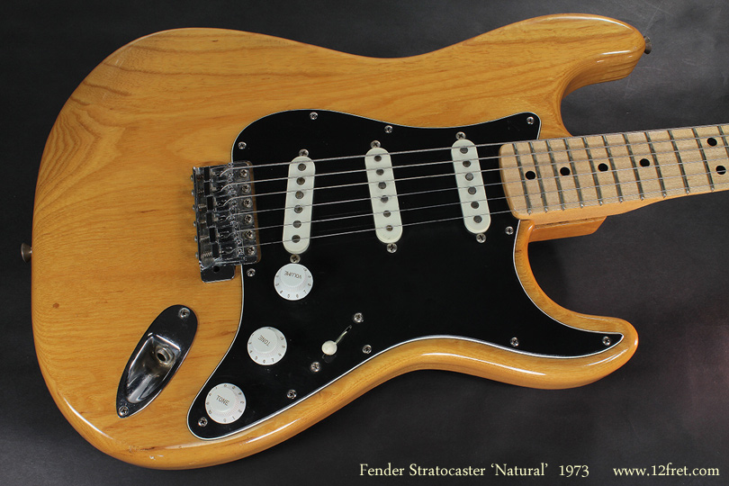 Here's a lovely Fender Stratocaster in Natural finish from 1973.   The Stratocaster was an instant hit when introduced in 1954 and has stayed popular since then.  

This good-condition example from 1973 features a natural finish, mostly original hardware and has been refretted so it plays really well.