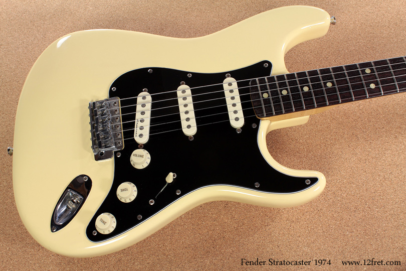 Here's a 1974 Fender Stratocaster Refinished White.   This is a solid playable instument, with its value in that aspect and less so in its age.