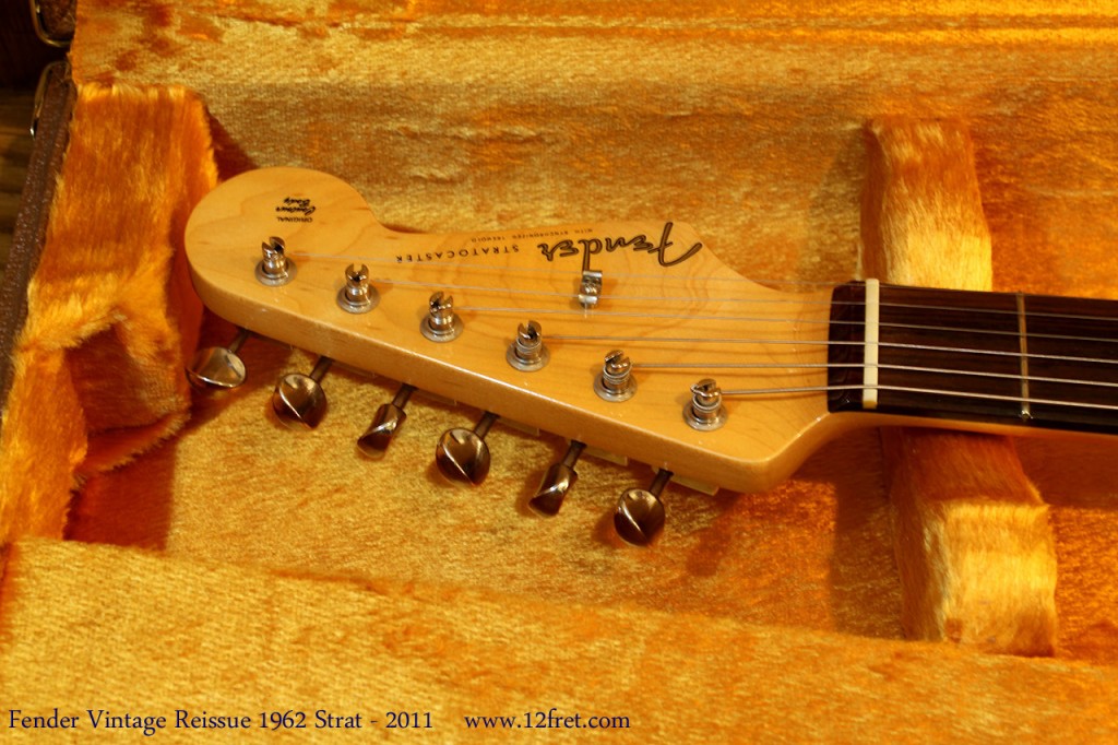 From 2011, here's a Fender Vintage Reissue 1962 Stratocaster in amazingly clean condition; even the case candy looks untouched.  The guitar plays perfectly, too!