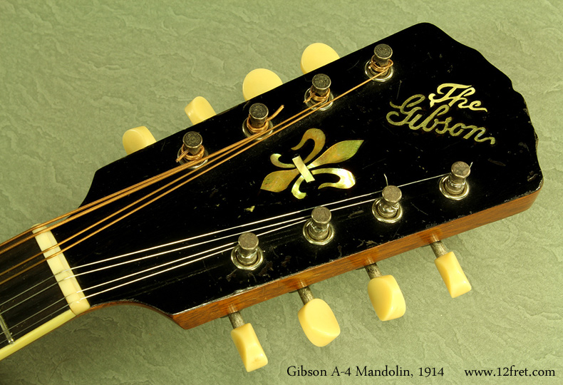 Here's a lovely Gibson A-4 Mandolin from 1914.  This instrument is in good working order with some wear as expected on an instrument almost a century old!  Tonally, it has a nice bite and lots of volume, and is lots of fun to play.
