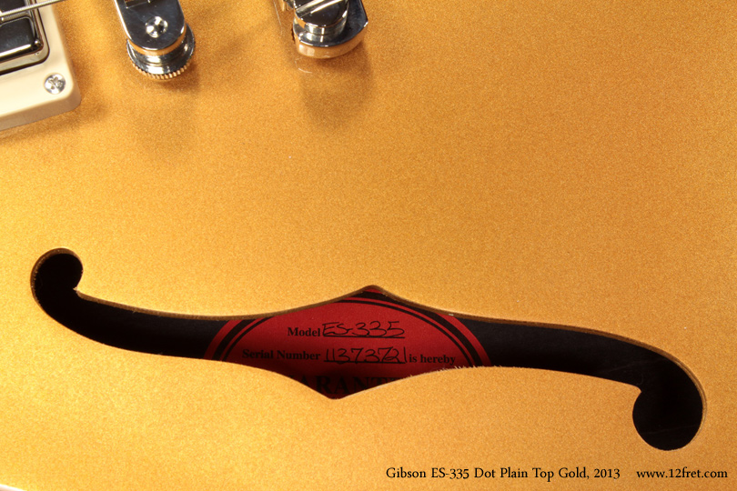 Here's an unexpected stunner - a Gibson ES-335 Gold Thinline Archtop! 

The official designation for this guitar is 