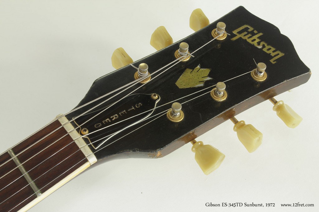 This example of the Gibson ES-345TD (the TD standing for Thinline body, Double pickups) is in good physical condition with no breaks, little scratching and one small chip at the top of the back of the head.  It's in good playing condition; it was professionally refretted and there isn't a lot of wear on the frets.