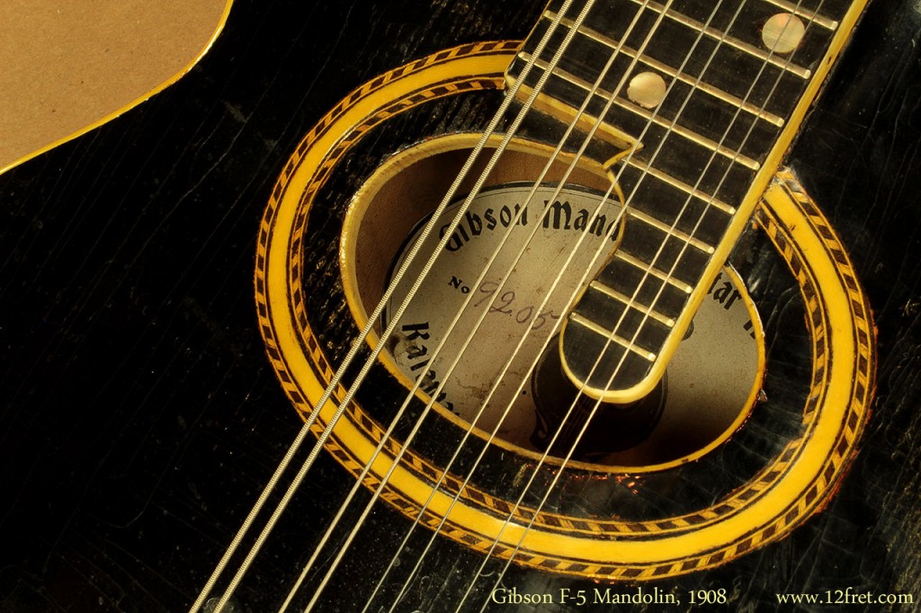 Here's a lovely three-point Gibson F-2 mandolin from 1908. It's in overall good condition with an excellent tone and action.