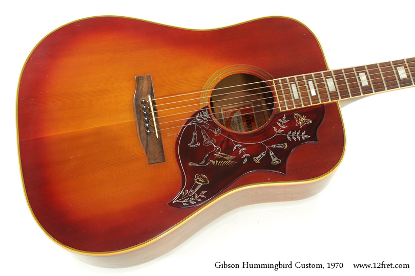 This is a 1970 Gibson Hummingbird Custom, and while it's seen a lot of playing in smoky rooms over the years, it's got a great sound and is in overall decent condition.