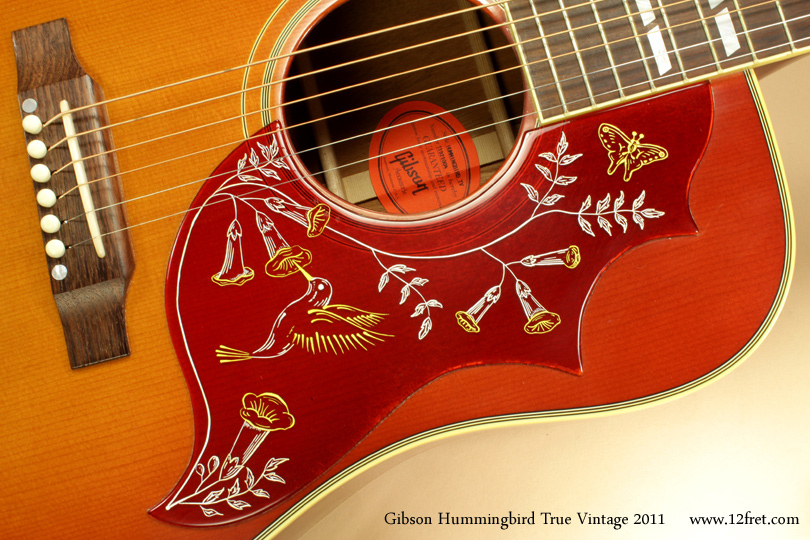 Here's an almost perfect 2011 Gibson Hummingbird True Vintage.   Gibson introduced the Hummingbird in 1960 and it was their first square-shouldered dreadnought body guitar; to this point, Gibson was known for slope-shouldered dreadnoughts like the J-45.