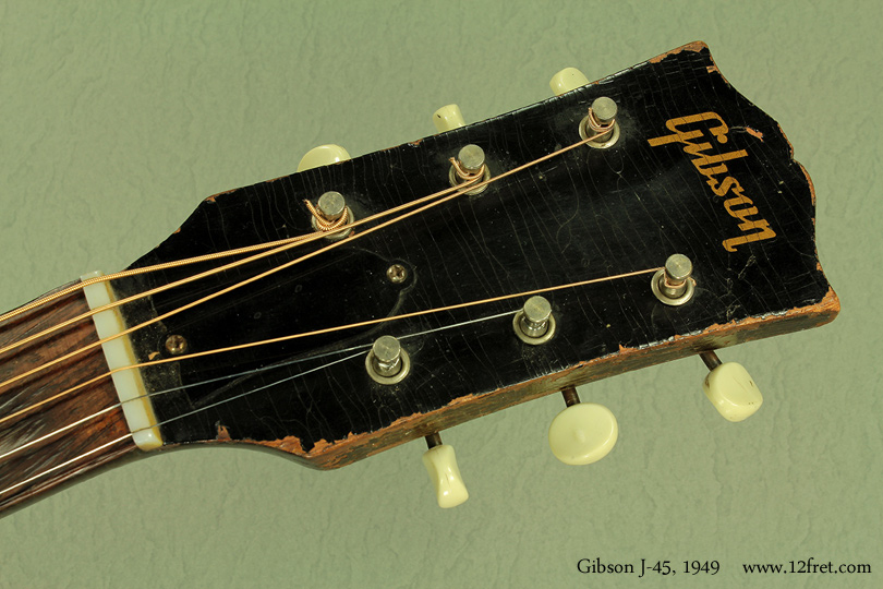 Here's a wonderful, seasoned Gibson J-45 from 1949.  Warm, full and resonant, but not overly bassy, this demonstrates the classic J-45 sound,  the reason that this model has been so popular since its introduction in 1942. 

This guitar has been used as intended over the last sixty-plus years, and there's wear to prove it. That use also contributes to its great sound.