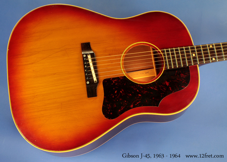 The Gibson J-45 is an iconic American guitar and has appeared on countless stages and recordings.    This cherryburst example is from 1963 or 1964; Gibson serial numbers are not definitive for this period.

This is a really good sounding guitar, and is structurally in quite good condition.