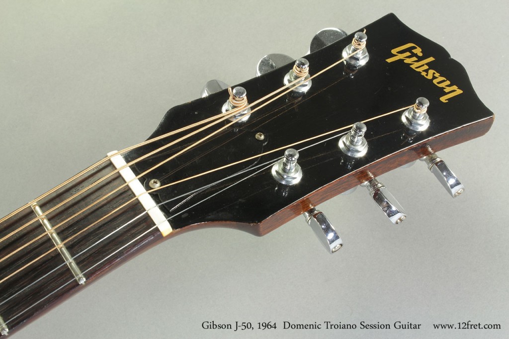 Here's a guitar with history.   This Gibson J-50 in natural was owned by the late, great Domenic Troiano and was used by him on many recording sessions.  It's in great playing condition and ready for use, with no appreciable fret wear and a decent setup.